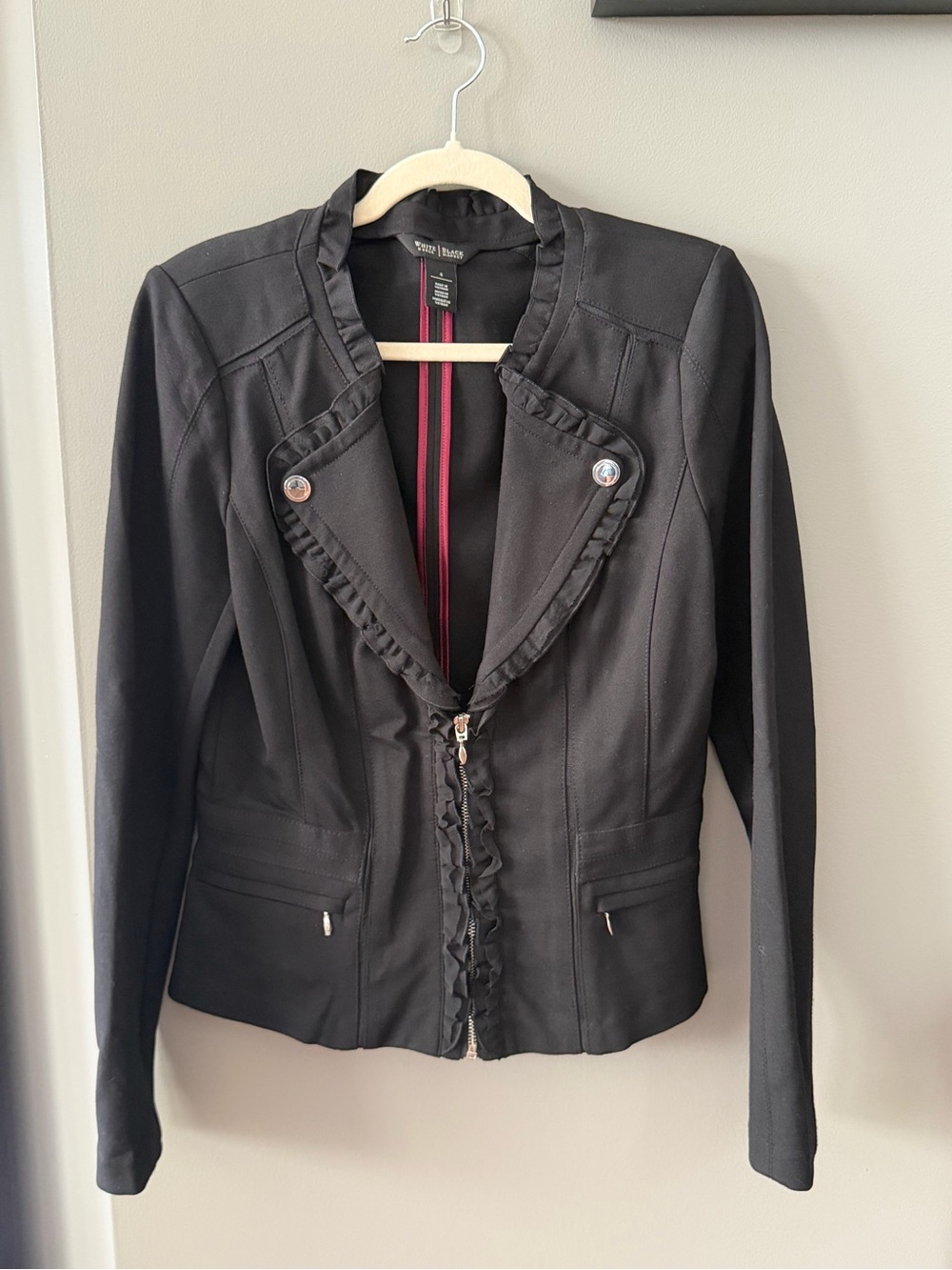 White House Black Market Black Ruffle-Trim Zip Jacket. Size 4